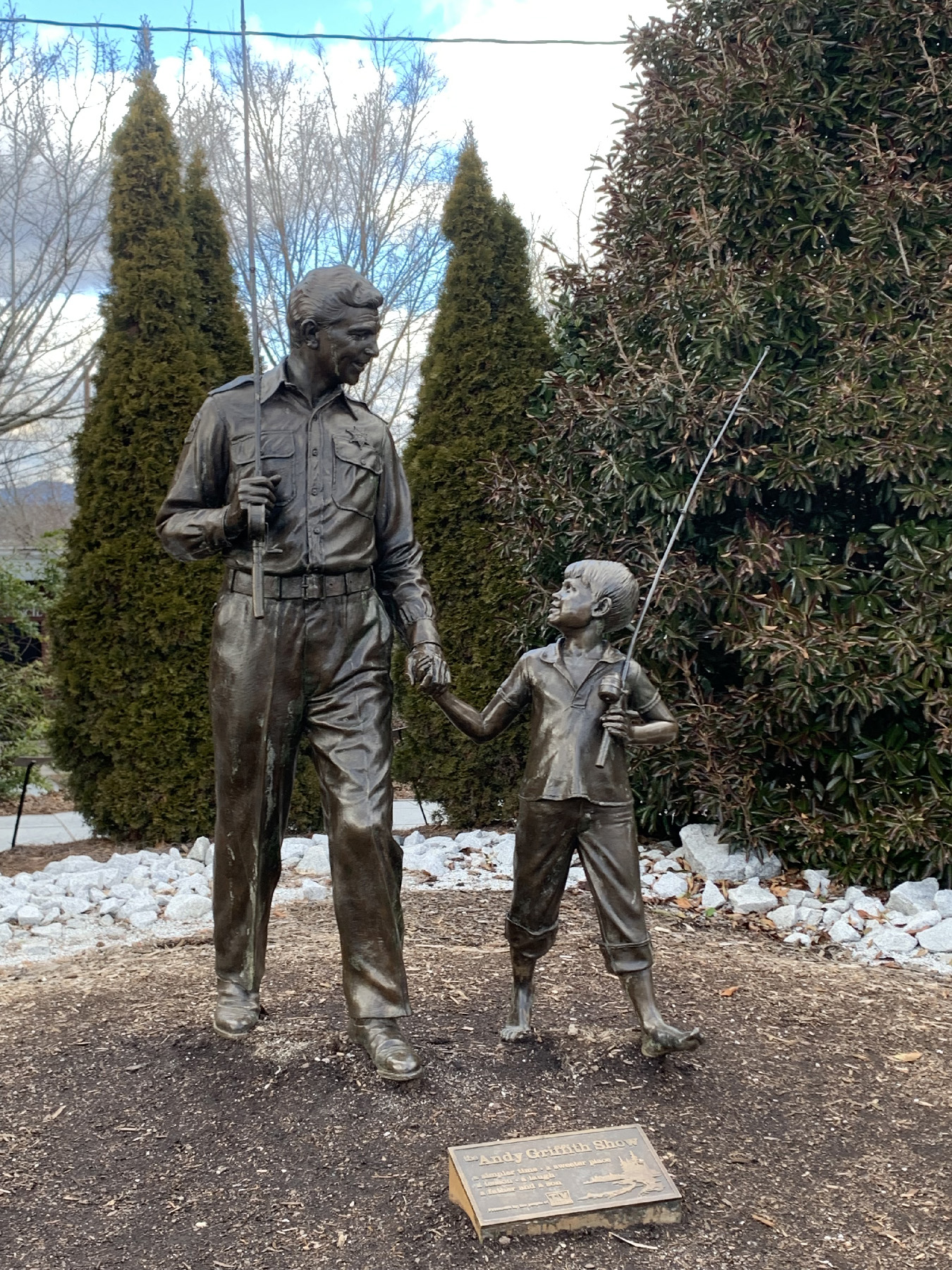 Statues of Andy Griffith (Sheriff Andy Taylor) and Ron Howard (Opie), stars of “The Andy Griffith Show,” are a photo op for tourists in front of the Andy Griffith Museum and Playhouse in Mount Airy, North Carolina.