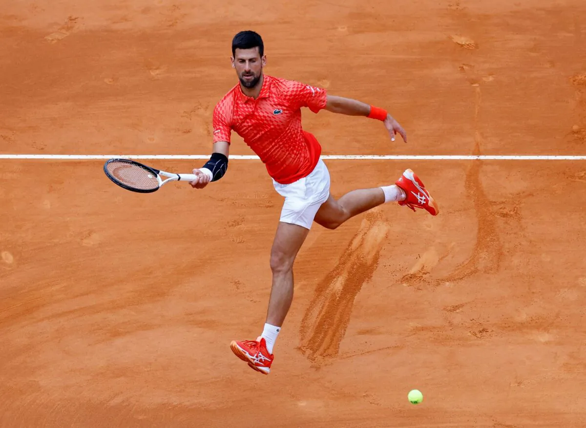 Serbia's Novak Djokovic in action during his round of 16 match against Italy's Lorenzo Musetti at the Rolex Monte-Carlo Masters at Monte-Carlo Country Club in Monte-Carlo, Monaco on April 13, 2023. (Eric Gaillard/Reuters)