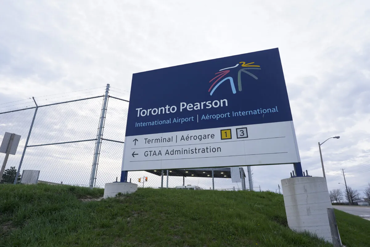 A sign for Toronto Pearson International Airport in Mississauga, Ont., on April 20, 2023. (Arlyn McAdorey/The Canadian Press)