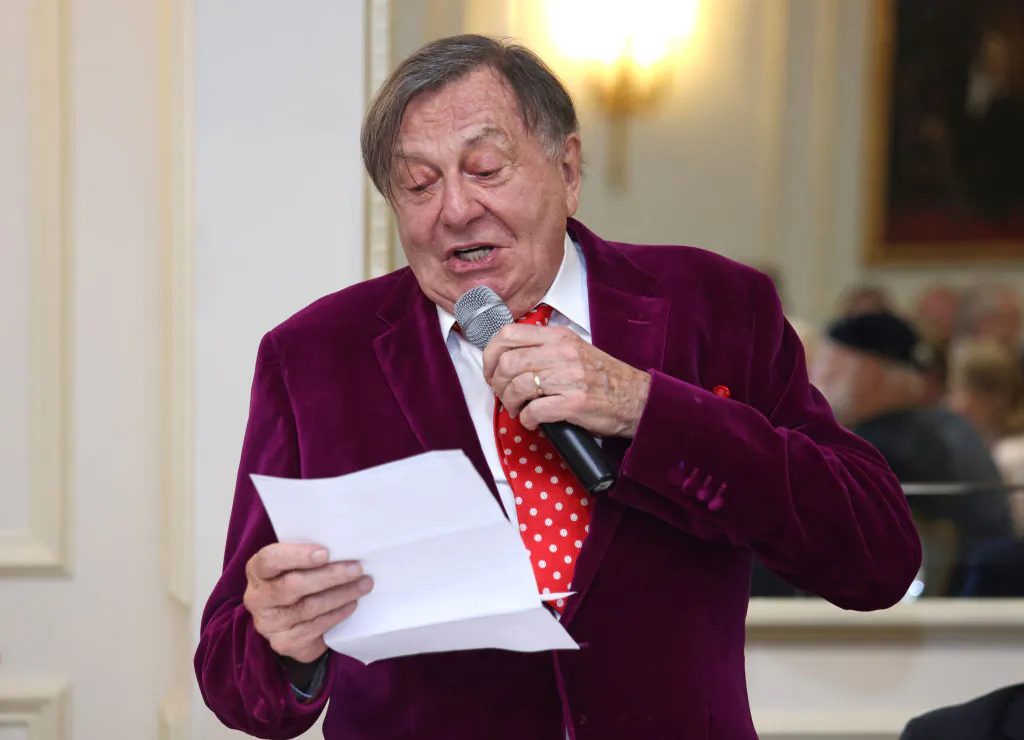 Barry Humphries accepts the Wizard of Oz award for his fictional character Sir Les Patterson at the Oldie Of The Year Awards 2021 at The Savoy Hotel in London, England, on Oct. 19, 2021. (Chris Jackson-Pool/Getty Images)