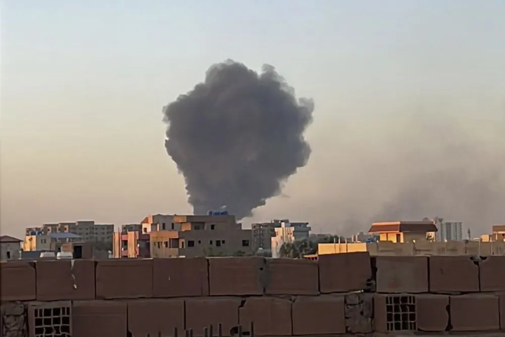 Smoke fills the sky in Khartoum, Sudan, on April 21, 2023.  (Maheen S via AP)