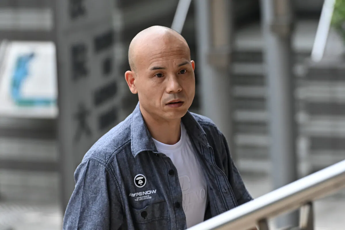 Pro-CCP thug Hu Aimin was convicted of two counts of criminal damage and sentenced to 15 weeks in prison. (Sung Pi-Lung/The Epoch Times)