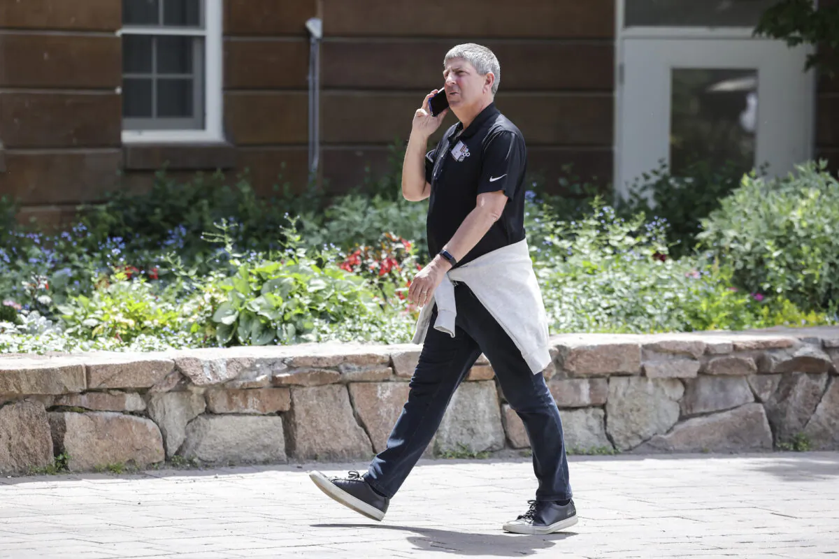Jeff Shell, then-CEO of NBCUniversal, talks on the phone as he arrives for a conference at Sun Valley, Idaho, on July 5, 2022. (Kevin Dietsch/Getty Images)