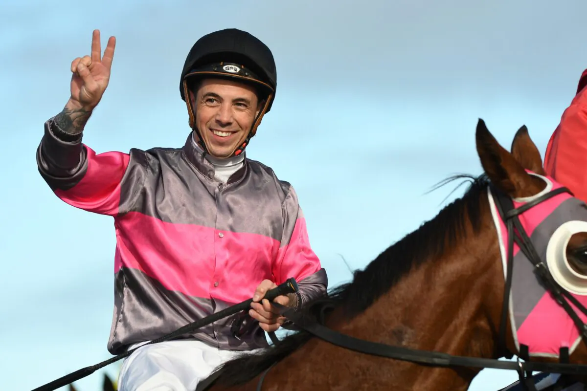 Jockey Dean Holland riding Inn Keeper after winning Race 8, the Midfield Group Wangoom Handicap, during the Warrnambool Jumps Carnival at Warrnambool Racing Club in Warrnambool, Australia, on May 5, 2021. (Vince Caligiuri/Getty Images)