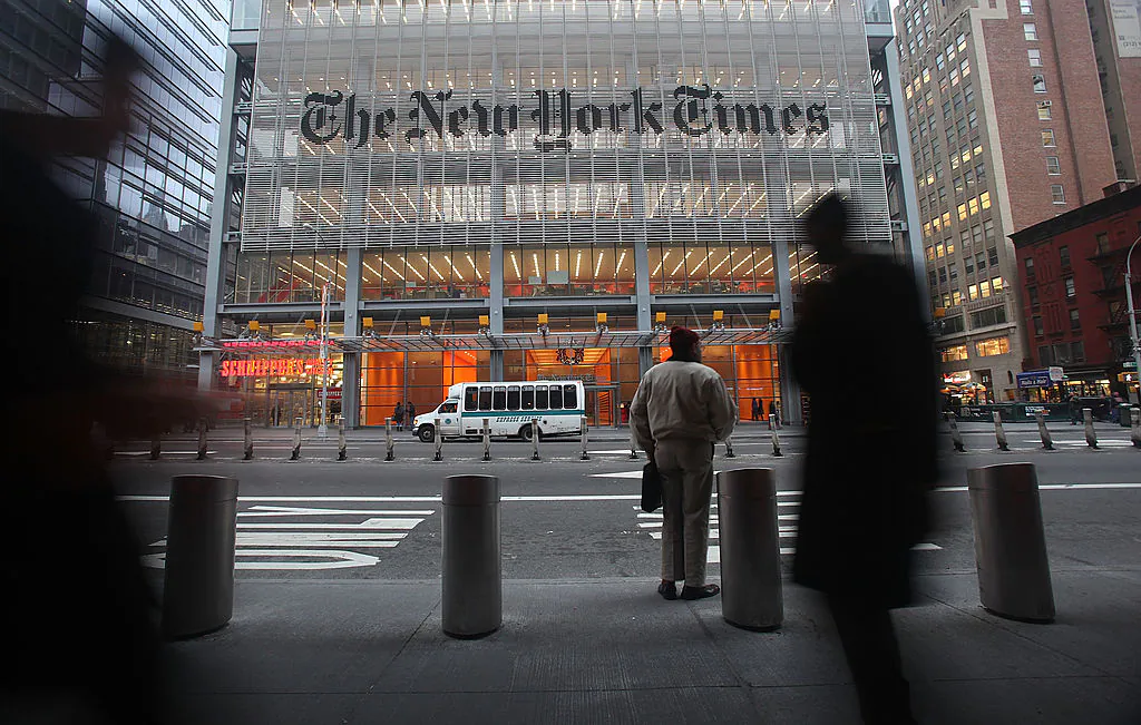 The New York Times' masthead is displayed in front of the midtown headquarters on December 7, 2009 in New York City. (Photo by Mario Tama/Getty Images)