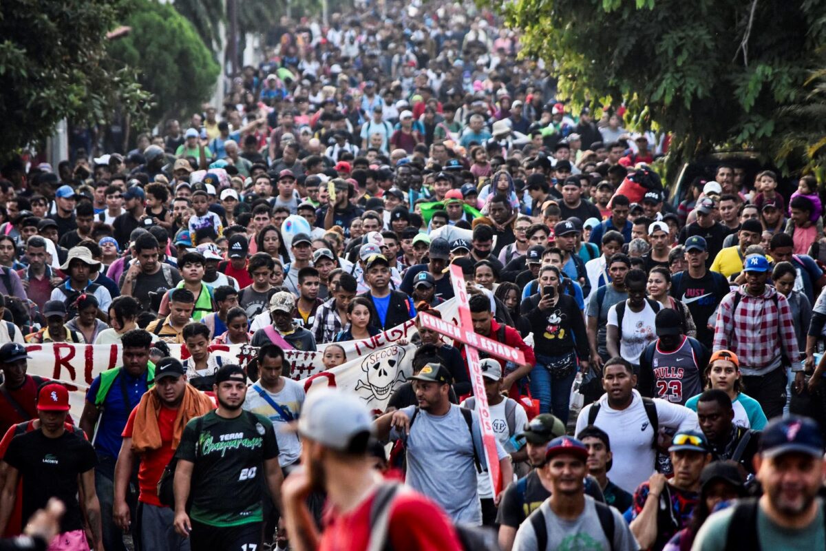 Migrants from Central and South America take part in a caravan attempting to reach the U.S.–Mexico border, in Tapachula, Chiapas state, southern Mexico, on April 23, 2023. (STRINGER/AFP via Getty Images)