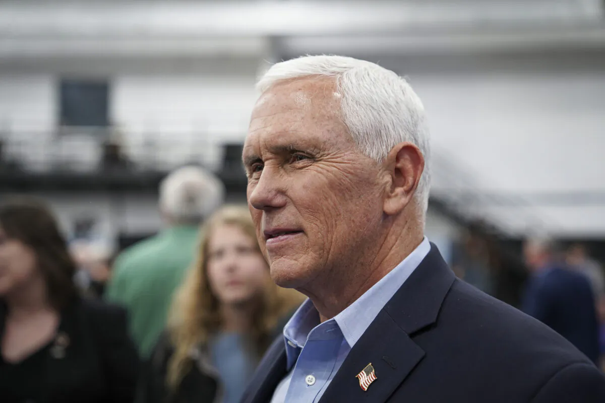 Former Vice President Mike Pence meets with guests at the Iowa Faith & Freedom Coalition in Clive, Iowa, on April 22, 2023. (Madalina Vasiliu/The Epoch Times)