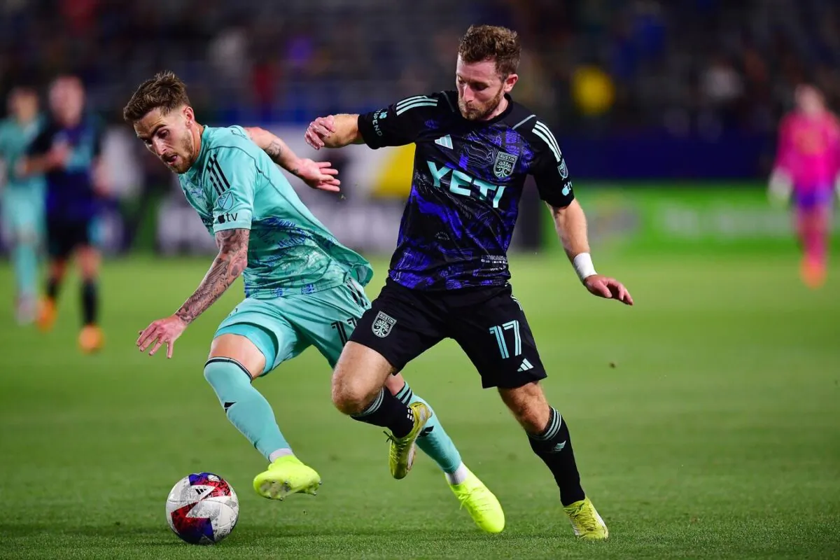 Los Angeles Galaxy midfielder Tyler Boyd (11) moves the ball against Austin FC forward Jon Gallagher (17) during the first half at Dignity Health Sports Park in Carson, Calif., on April 22, 2023 (Gary A. Vasquez/USA TODAY Sports via Field Level Media)