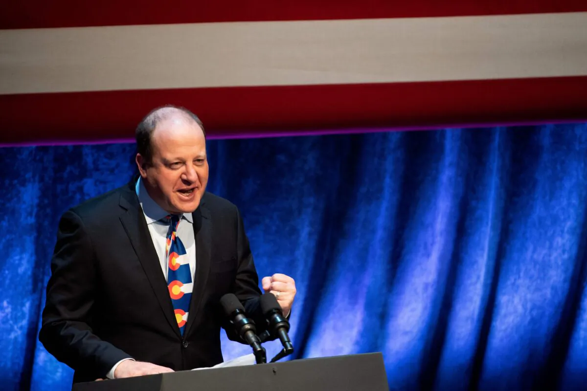 Colorado Gov. Jared Polis speaks before introducing Vice President Kamala Harris before a discussion on tackling climate change in Arvada, Colo., on March 6, 2023. (Jason Connolly/AFP via Getty Images)