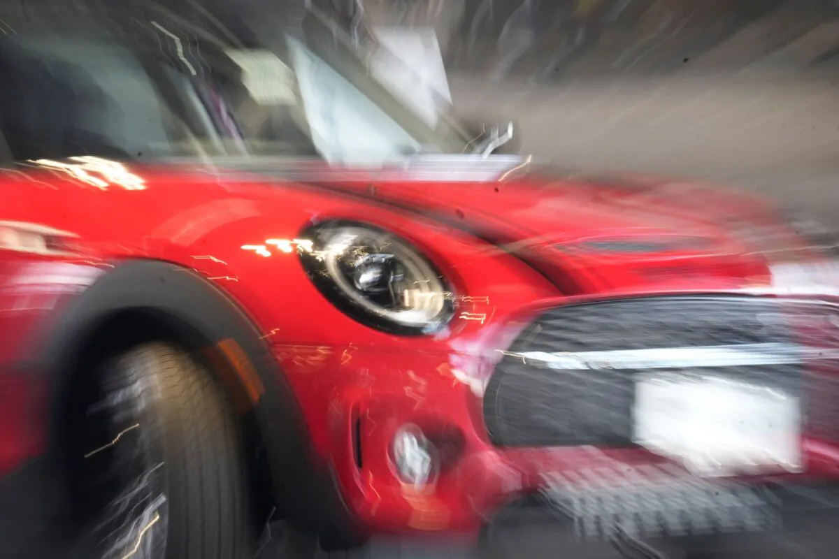 A 2023 Cooper Clubman S sports-utility vehicle is displayed on the showroom floor of a Mini dealer in Highlands Ranch, Colo., on April 20, 2023. (David Zalubowski/AP Photo)