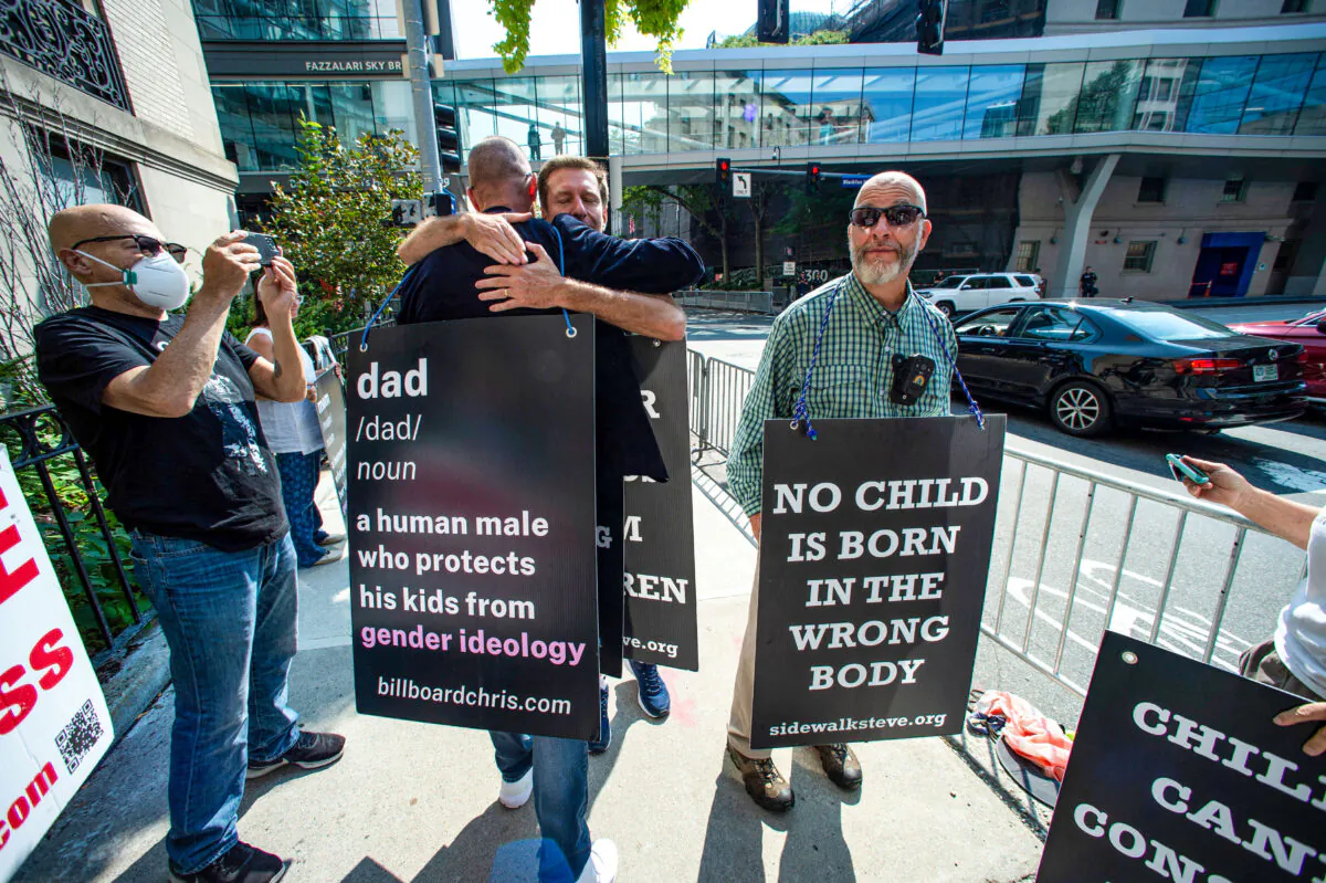 Protesters stand outside of Boston Childrens Hospital in Boston, Massachusetts, on Sept. 18, 2022. (JOSEPH PREZIOSO/AFP via Getty Images)