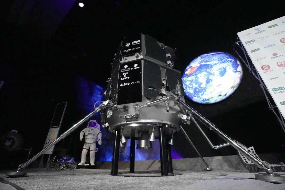 A model of the lander of HAKUTO-R private lunar exploration program is displayed prior to livestream of the lunar landing event at Miraikan, the National Museum of Emerging Science and Innovation, in Tokyo on April 26, 2023. (Eugene Hoshiko/AP Photo)