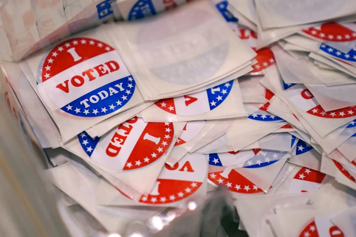 A bin of "I Voted Today" stickers rests on a table at a polling place in Stratham, N.H., on Sept. 13, 2022. (Charles Krupa/AP Photo)