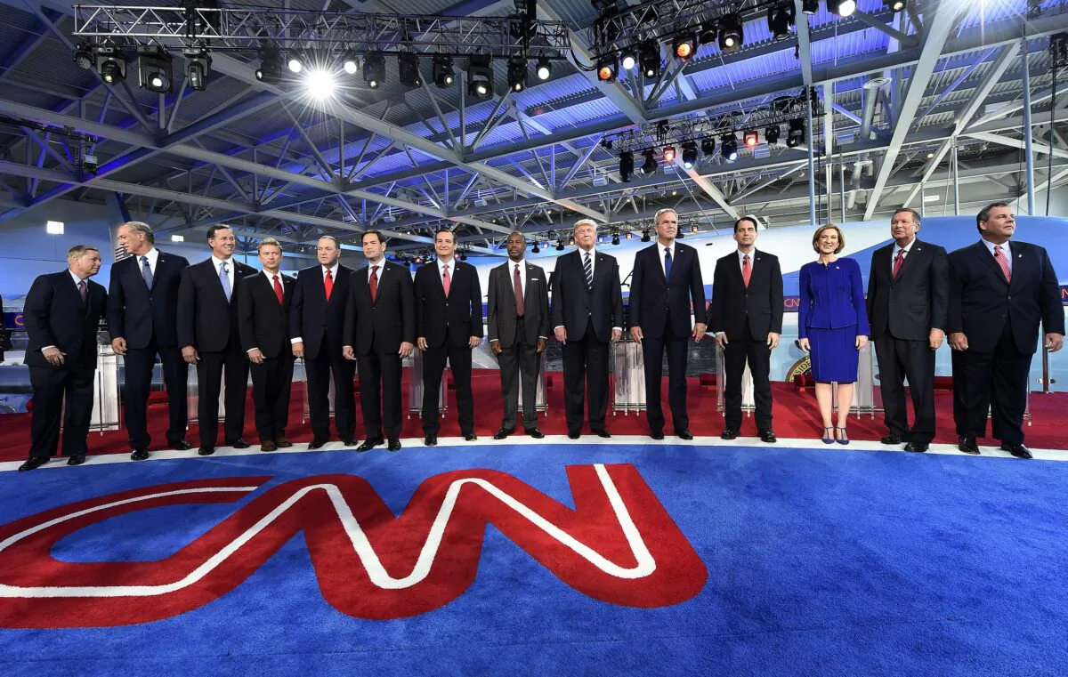 Republican presidential hopefuls arrive on stage for the Republican presidential debate at the Ronald Reagan Presidential Library in Simi Valley, California on Sept. 16, 2015. (Robyn Beck/AFP via Getty Images)