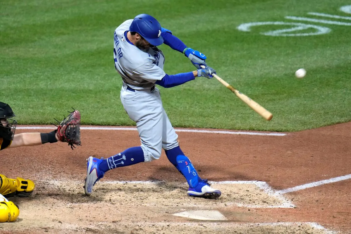 Los Angeles Dodgers' Chris Taylor hits a three-run home run off Pittsburgh Pirates relief pitcher Colin Holderman during the eighth inning of a baseball game in Pittsburgh, on April 25, 2023. (Gene J. Puskar/AP Photo)