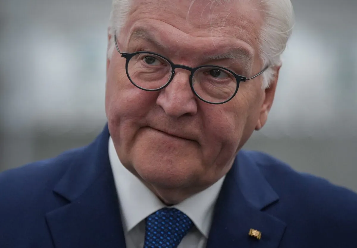 Germany President Frank-Walter Steinmeier listens during a tour of fuel cell stack manufacturer, Cellcentric Canada, in Burnaby, B.C., on April 25, 2023. (The Canadian Press/Darryl Dyck)