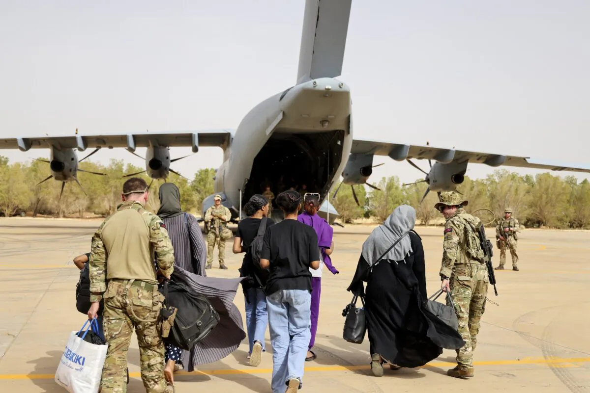 British nationals being evacuated by UK military personnel from Khartoum, Sudan, on April 25, 2023. (PO Phot Arron Hoare/Ministry of Defence via PA Media)