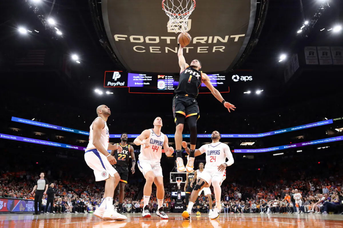 Devin Booker (1) of the Phoenix Suns dunks the ball during the third quarter against the LA Clippers in game five of the Western Conference First Round Playoffs at Footprint Center in Phoenix, Ariz., on April 25, 2023. (Christian Petersen/Getty Images)
