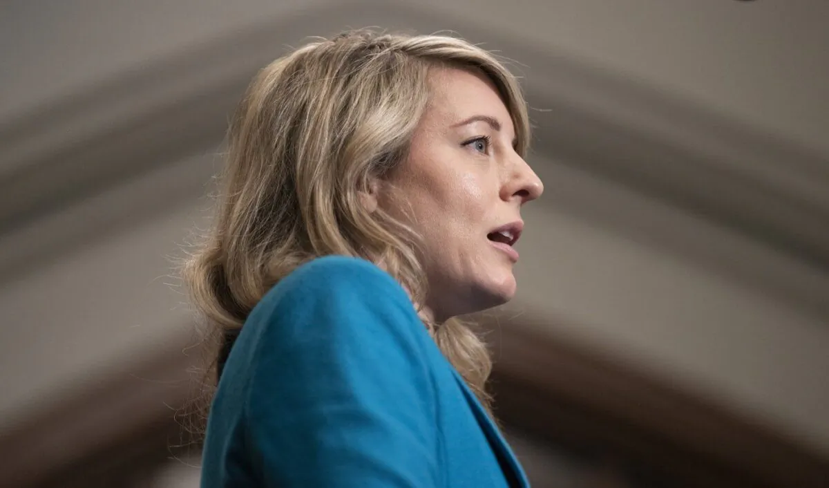 Foreign Affairs Minister Melanie Joly speaks with reporters as she heads to a meeting of cabinet on Parliament Hill in Ottawa, April 25, 2023. (The Canadian Press/Adrian Wyld)
