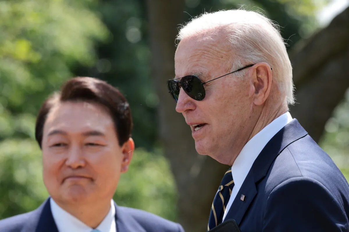 U.S. President Joe Biden (R) and South Korean President Yoon Suk-yeol hold a joint press conference in the Rose Garden at the White House on April 26, 2023. (Win McNamee/Getty Images)