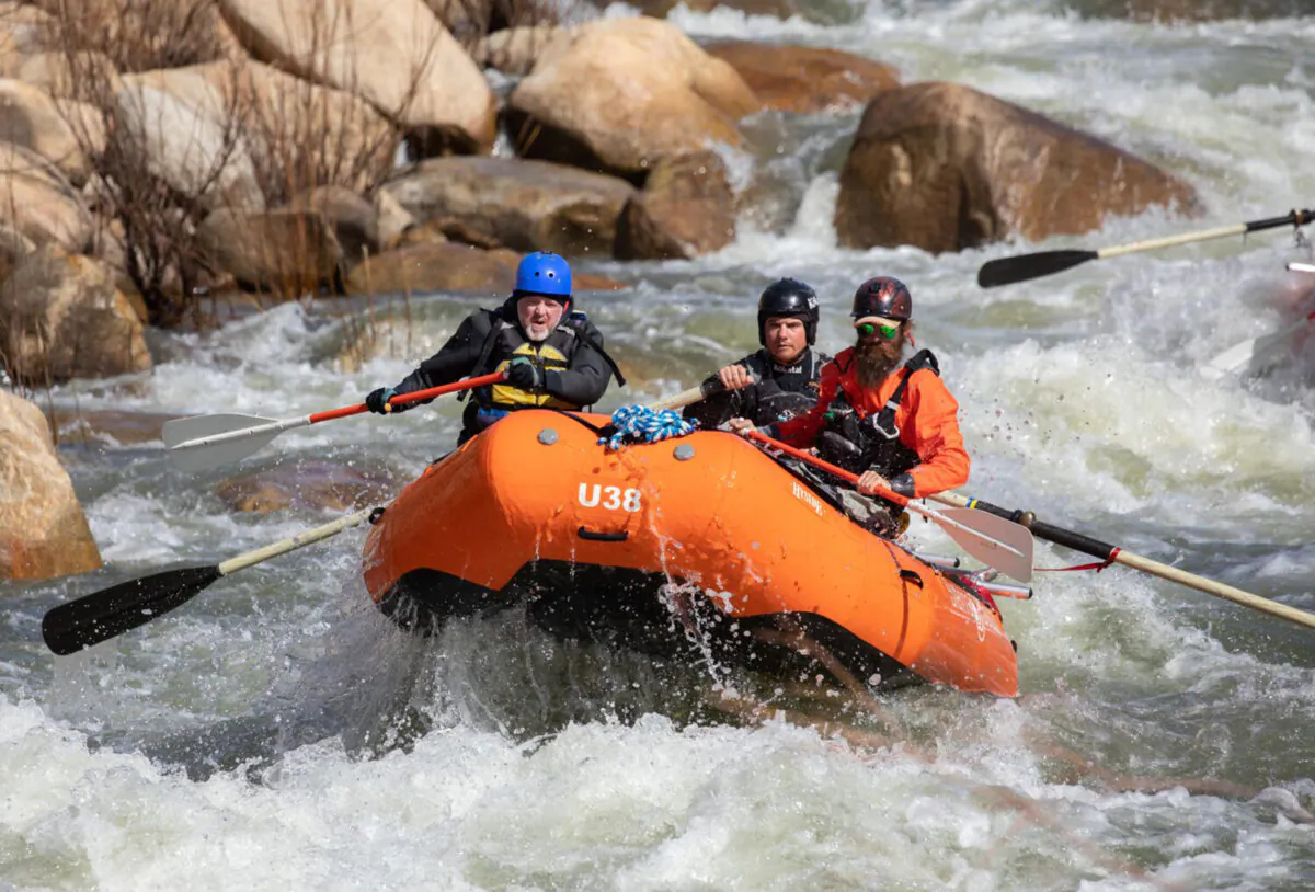 Los Angeles Times reporter Jack Dolan (L) negotiates The Wall during a whitewater tour with Evan Moore, general manager of Sierra South Mountain Sports, and guide Zach Wilfey on the upper Kern River on Thursday, April 6, 2023, in Kernville, California. The winter and early spring storms have brought plenty of water which is good news for the local businesses. (Myung J. Chun/Los Angeles Times/TNS)