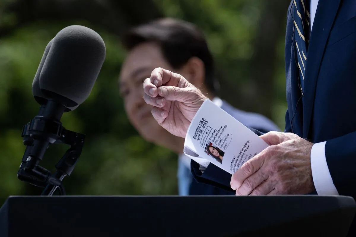 President Joe Biden holds his notes while answering a question during a press conference in the Rose Garden of the White House after a meeting with South Korea's President Yoon Suk Yeol, in Washington, on April 26, 2023. (Brendan Smialowski/AFP via Getty Images)