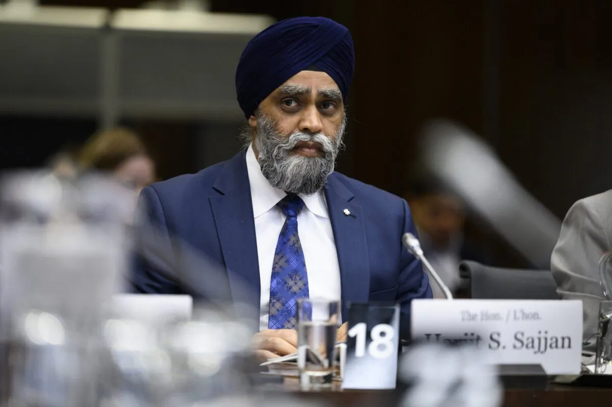 Minister of International Development Harjit Sajjan prepares to appear at the Standing Committee on Citizenship and Immigration, studying the government's response to the final report on the Special Committee on Afghanistan, in Ottawa, on April 26, 2023. (The Canadian Press/Justin Tang)