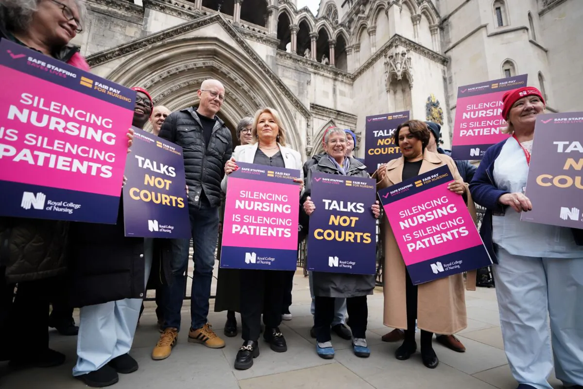 Royal College of Nursing General Secretary Pat Cullen (centre) joins nurses outside the High Court in central London, on April 27, 2023. (James Manning/PA Media)