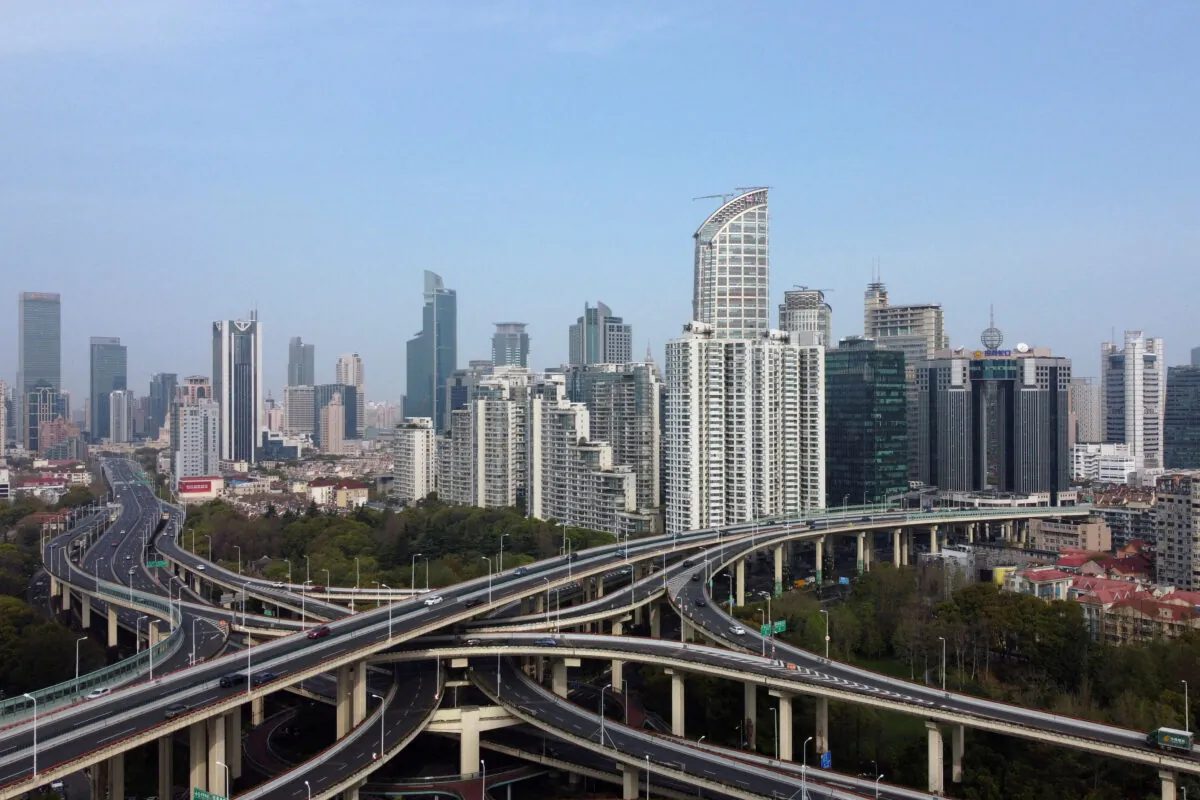 An aerial view shows highways and buildings in Shanghai, China, on March 30, 2022. (Aly Song/Reuters)
