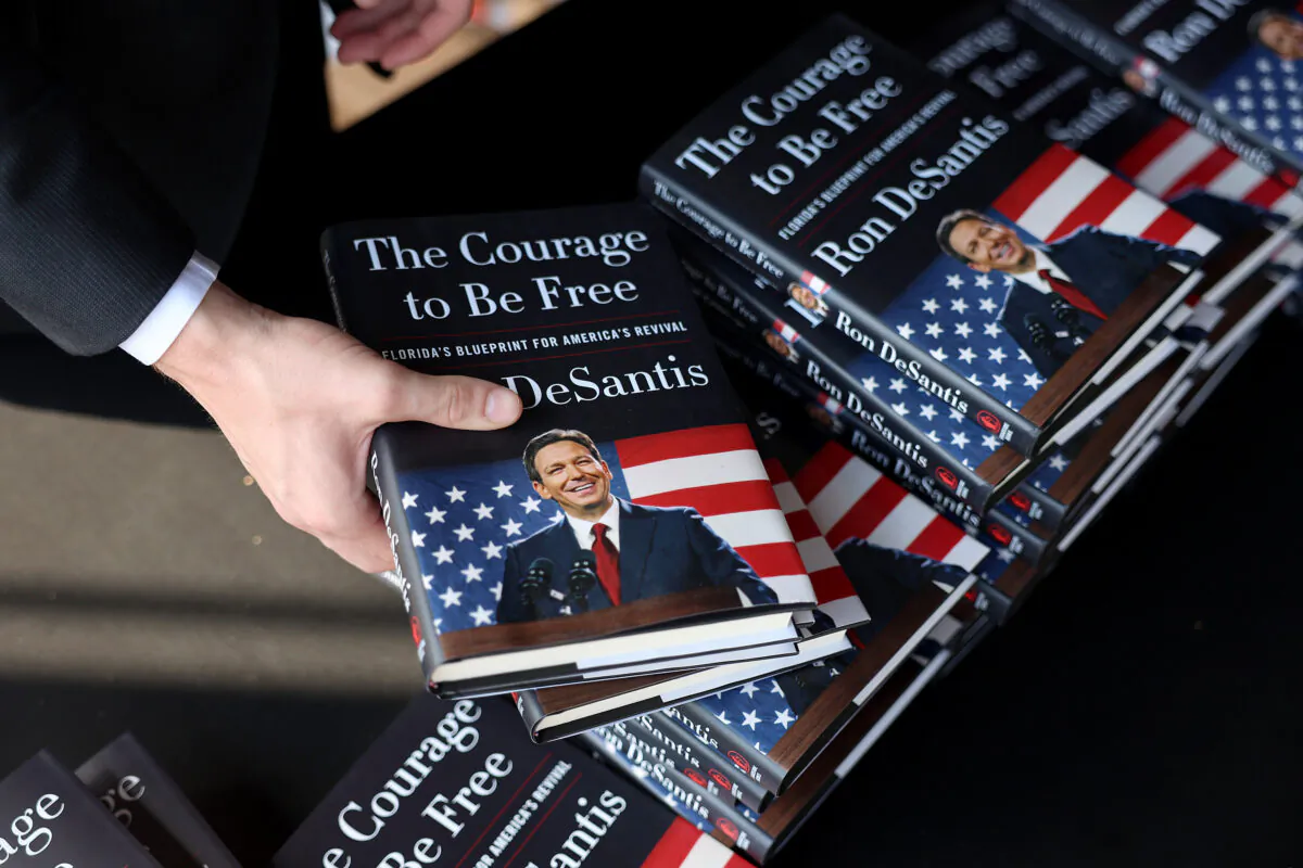Copies of Florida Gov. Ron DeSantis's newly released book, “The Courage To Be Free: Florida’s Blueprint For America’s Revival” at the Orange County Choppers Road House in Pinellas Park, Florida, on March 8, 2023. (Joe Raedle/Getty Images)