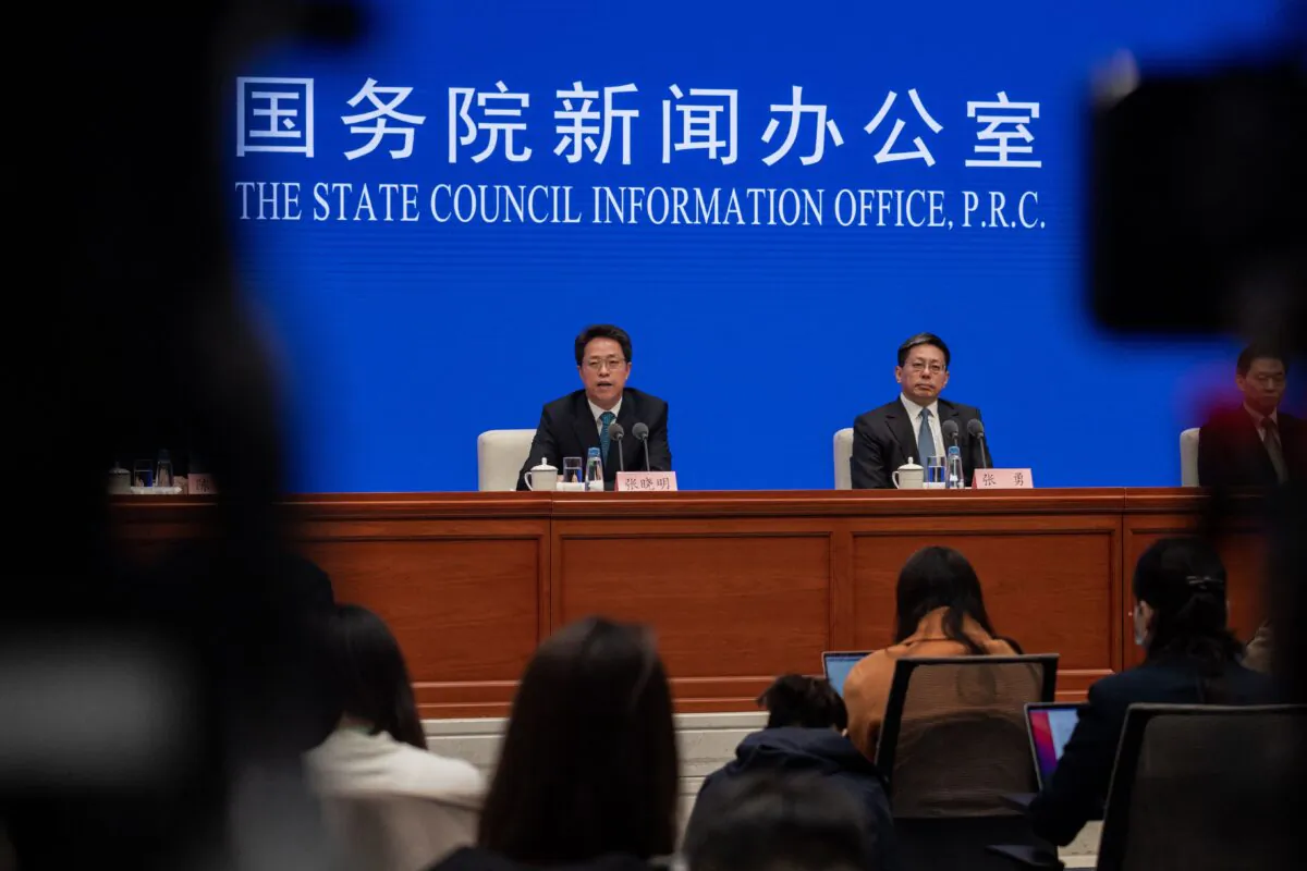 Zhang Xiaoming (L), executive deputy director of the Hong Kong and Macau Affairs Office of the State Council, speaks next to Zhang Yong, deputy director of the Legislative Affairs Commission of Chinas Standing Committee of the National Peoples Congress, during a State Council press conference on Hong Kong electoral reform in Beijing on March 12, 2021. (Nicolas Asfouri/AFP via Getty Images)
