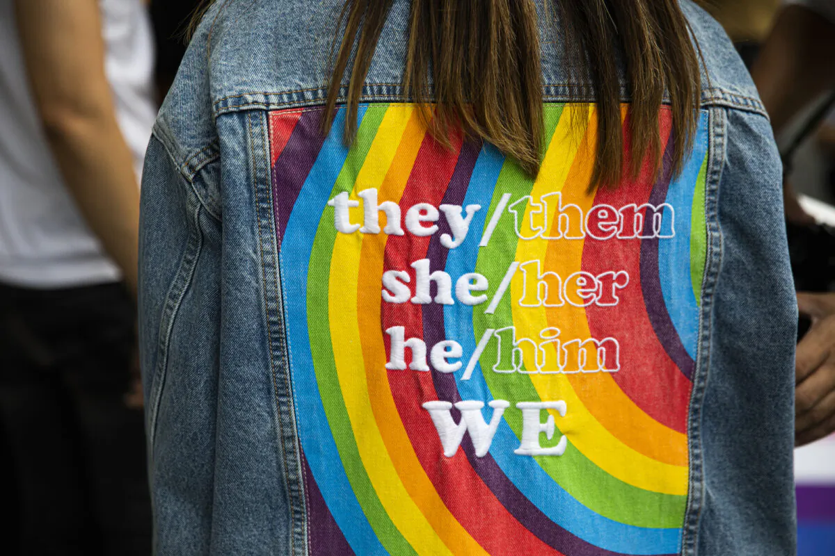 Pronouns on a jacket.
(Lauren DeCicca/Getty Images)