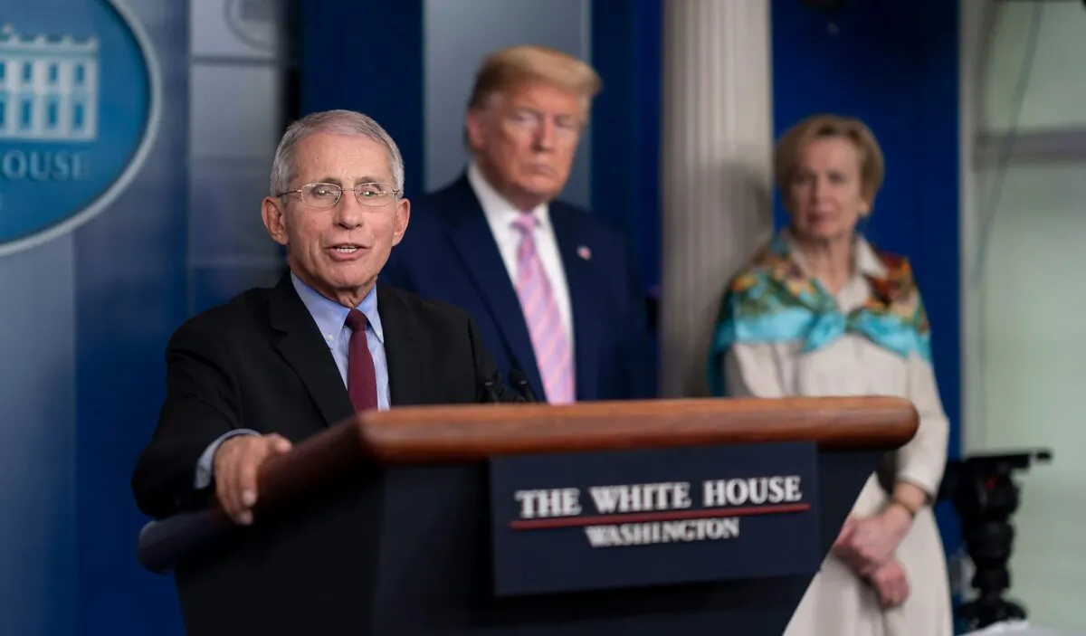 President Donald J. Trump listens as Dr. Anthony Fauci, director of the National Institute of Allergy and Infectious Diseases and a member of the White House Coronavirus Task Force, delivers remarks at a coronavirus (COVID-19) update briefing in the James S. Brady Press Briefing Room of the White House in Washington on April 4, 2020. (Andrea Hanks/White House/Flickr)