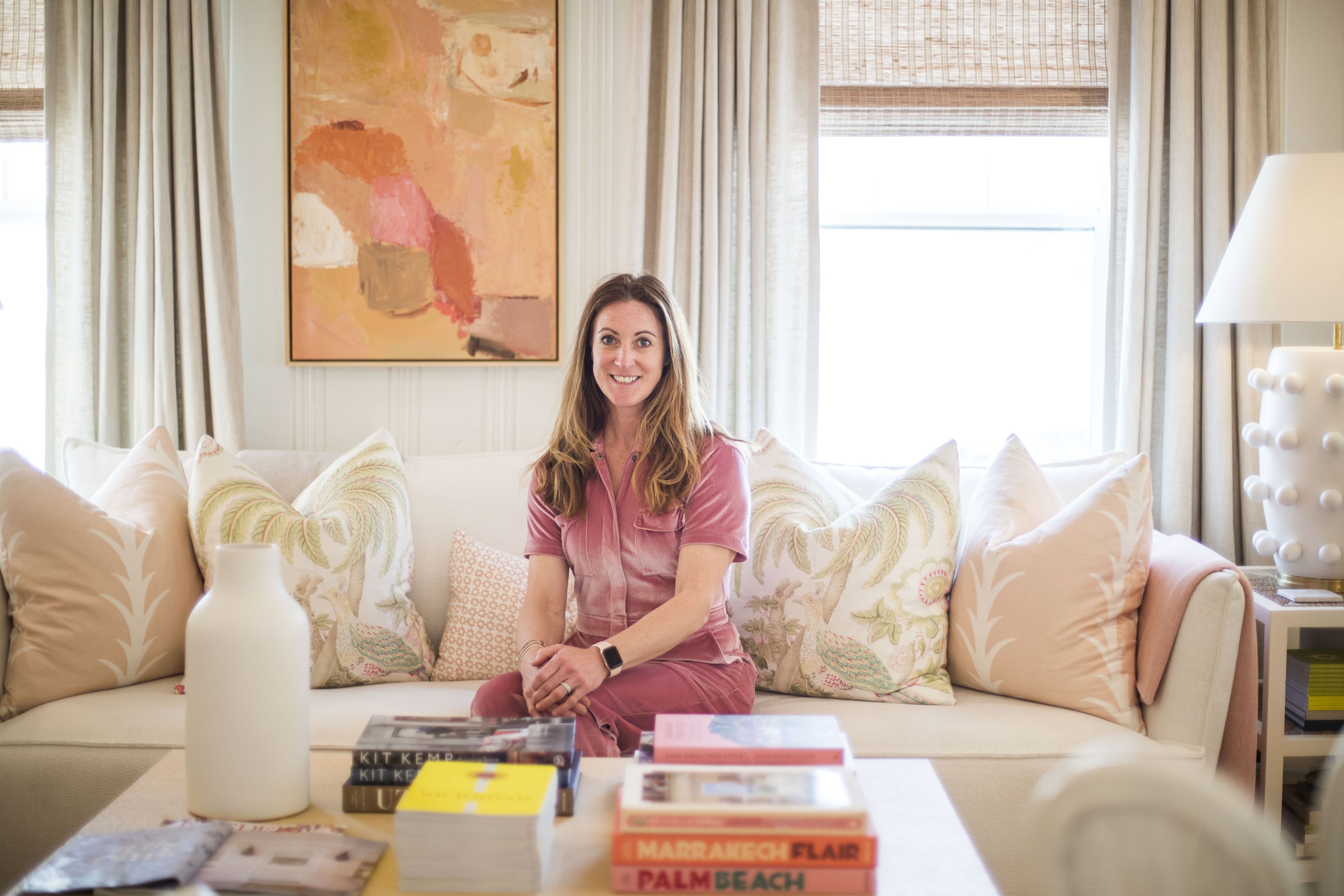 Katie Denton, owner of Bees Nees, in one of her renovated pink cottages, The Libby.