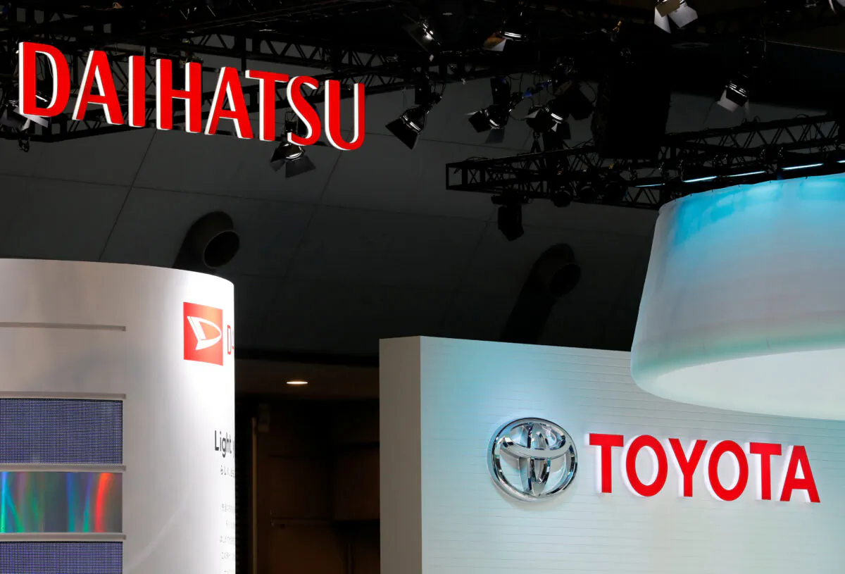 The logos of Daihatsu Motors and Toyota Motor at the 45th Tokyo Motor Show in Tokyo on Oct. 25, 2017. (Kim Kyung-Hoon/Reuters)