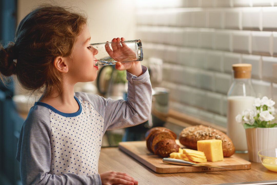 Young children have three to four times greater exposure to fluoride than adults. (Evgeny Atamanenko/Shutterstock)