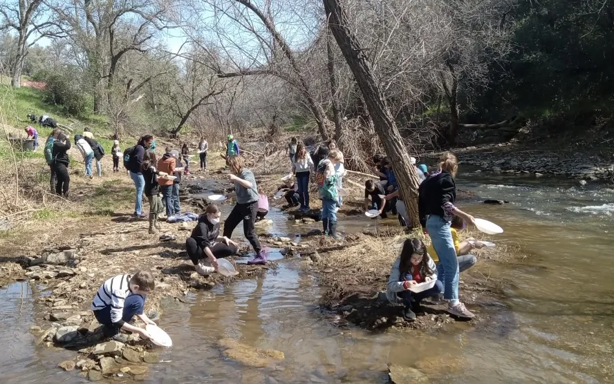 Tourists are seen panning gold during a tour with the California Gold Panning. (Courtesy of Nick Prebalick)