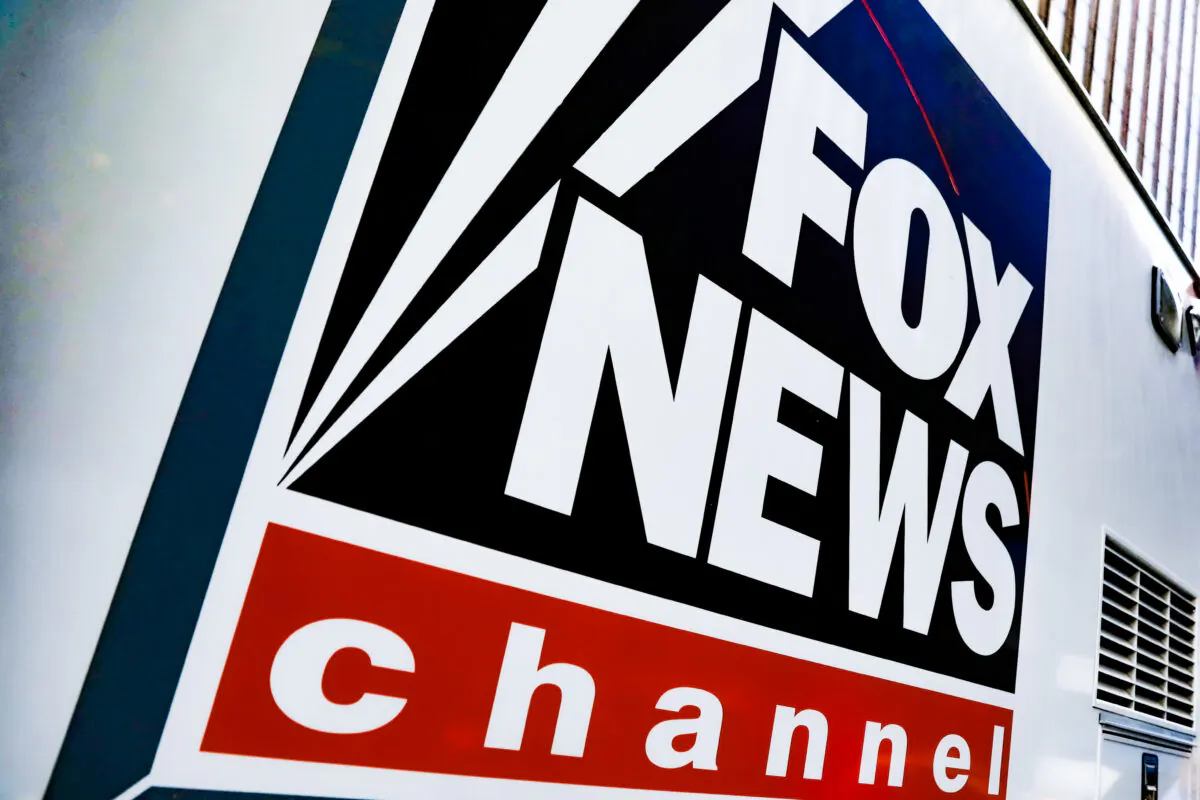 A Fox News channel sign is on a television vehicle outside the News Corporation building in New York City on Nov. 8, 2017. (Shannon Stapleton/Reuters)