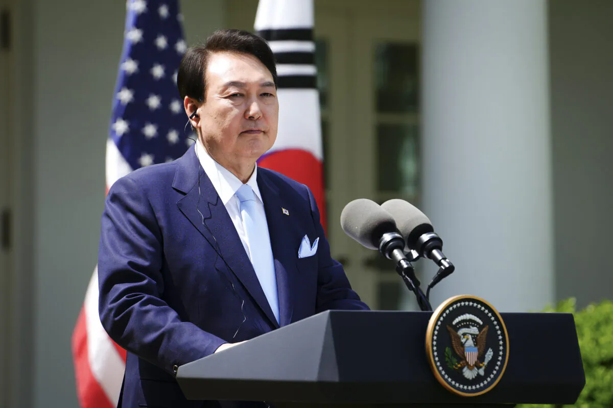 South Korean President Yoon Suk-yeol speaks at a press briefing at the White House garden in Washington on April 26, 2023. (Madalina Vasiliu/The Epoch Times)