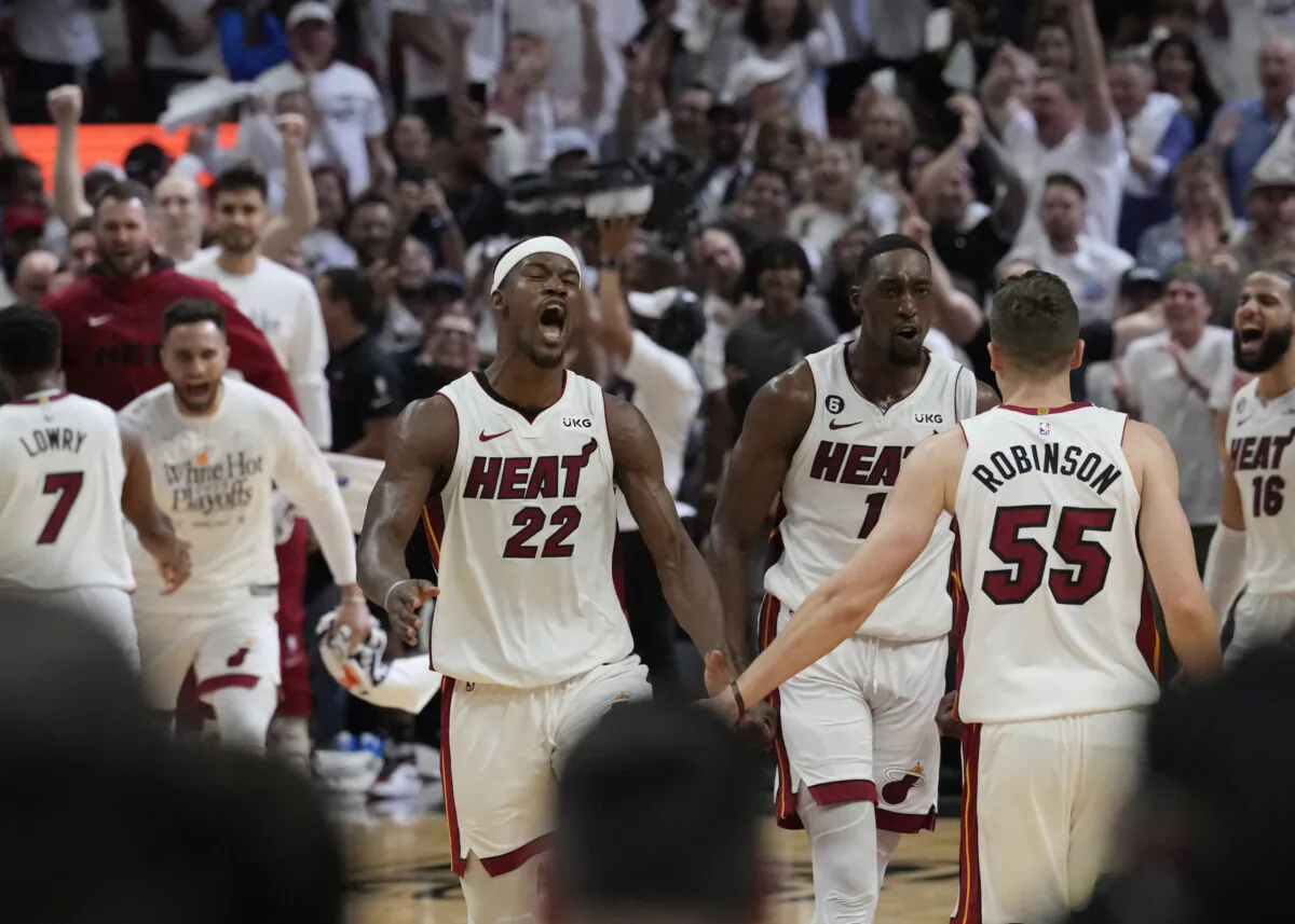 Miami Heat forward Jimmy Butler (22) celebrates after scoring during the second half of Game 4 in a first-round NBA basketball playoff series against the Milwaukee Bucks—Butler scored 56 points in Miami on April 24, 2023. (Marta Lavandier/AP Photo)