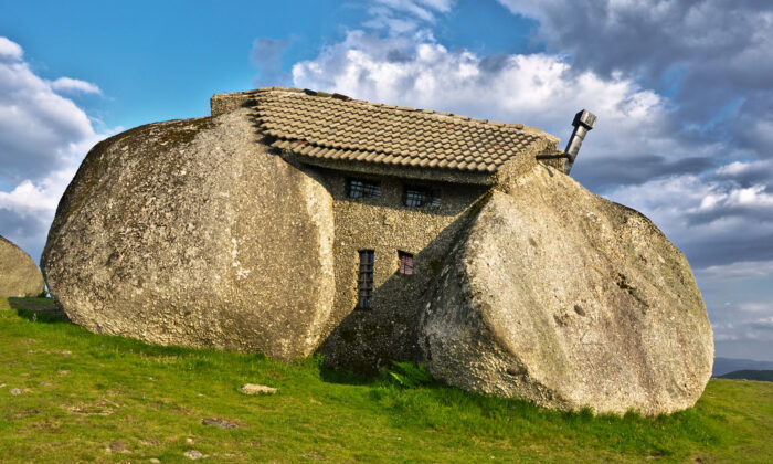 The Real-Life Flintstones Home: Bizarre 'Stone House' Built From Boulders Has Bulletproof Windows—but No Electricity