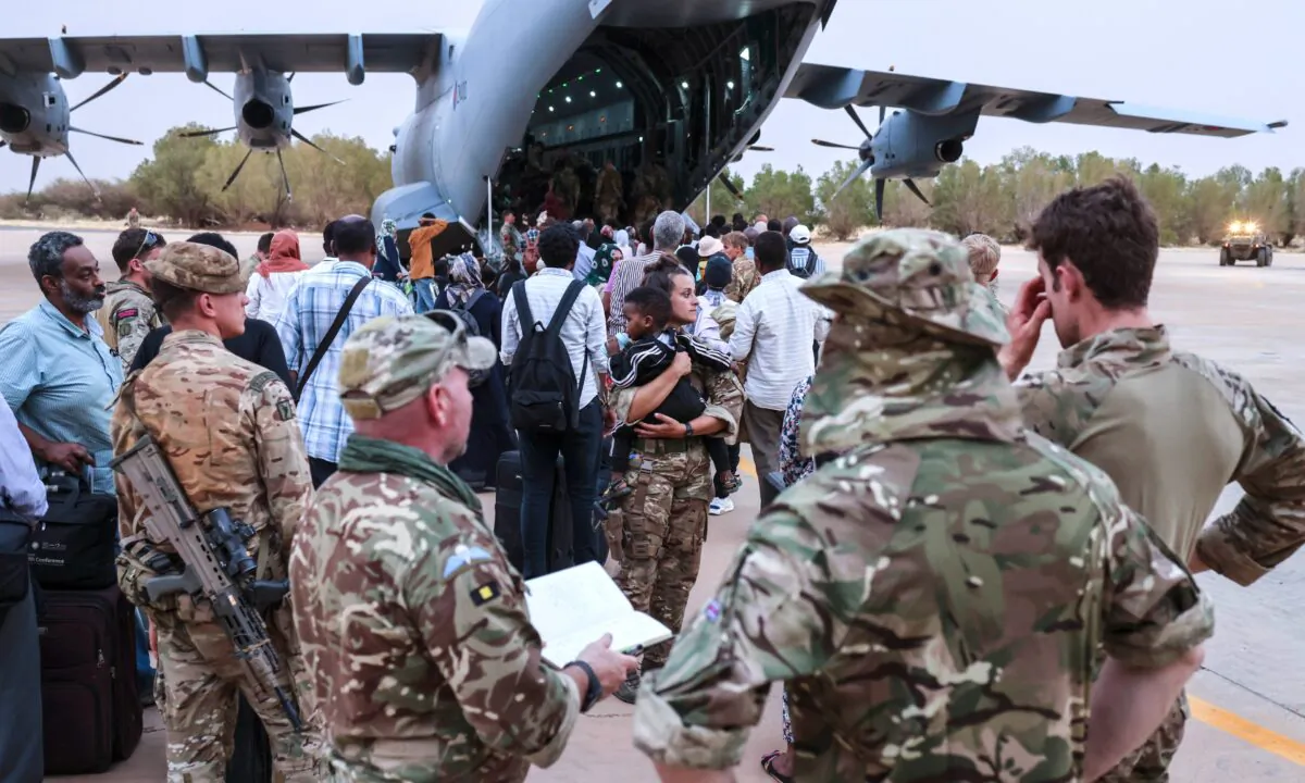 Evacuation of British Nationals onto an awaiting RAF aircraft at Wadi Seidna Air Base in Khartoum, Sudan, on April 27, 2023.  (Ministry of Defence/handout via PA)