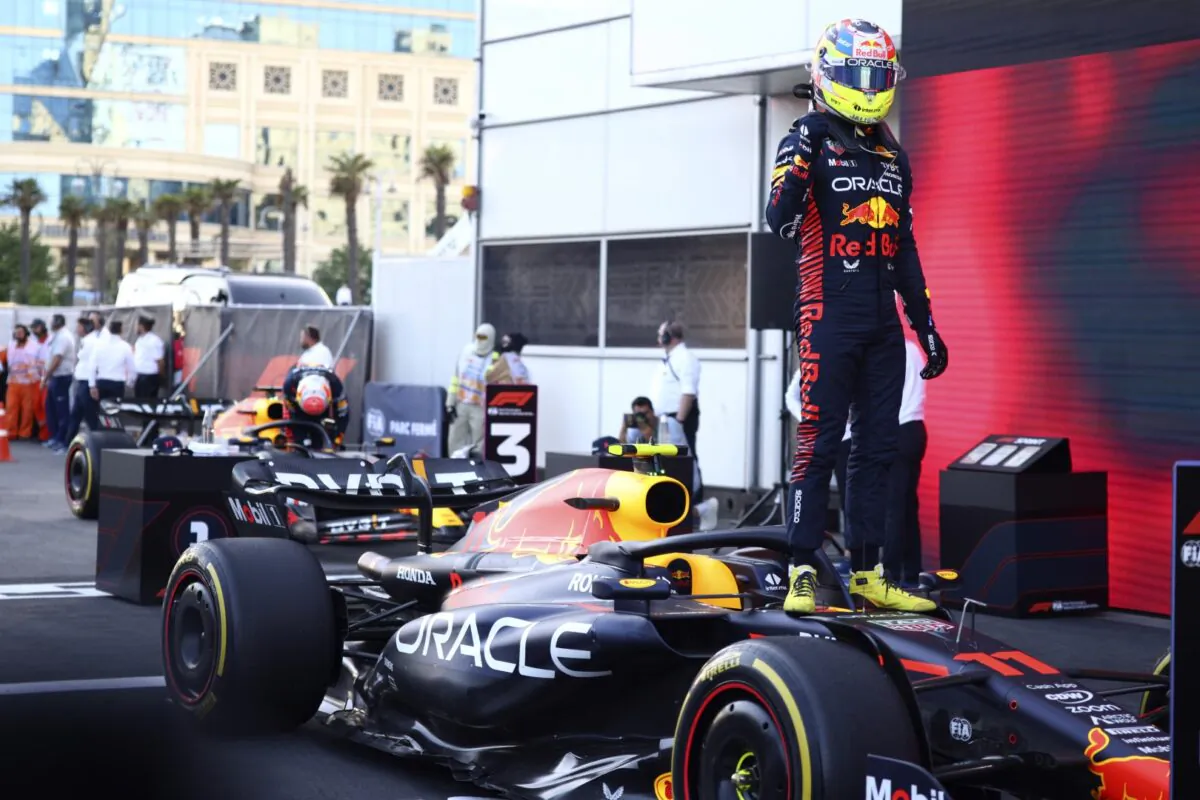 Red Bull driver Sergio Perez of Mexico celebrates after winning the sprint race at the Baku circuit in Baku, Azerbaijan, on April 29, 2023. (Lisi Niesner/Pool via AP)