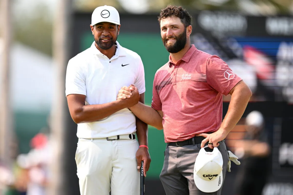 Tony Finau (L) of the United States shakes hands with Jon Rahm (R) of Spain after winning the Mexico Open at Vidanta in Puerto Vallarta, Jalisco on April 30, 2023. (Orlando Ramirez/Getty Images)