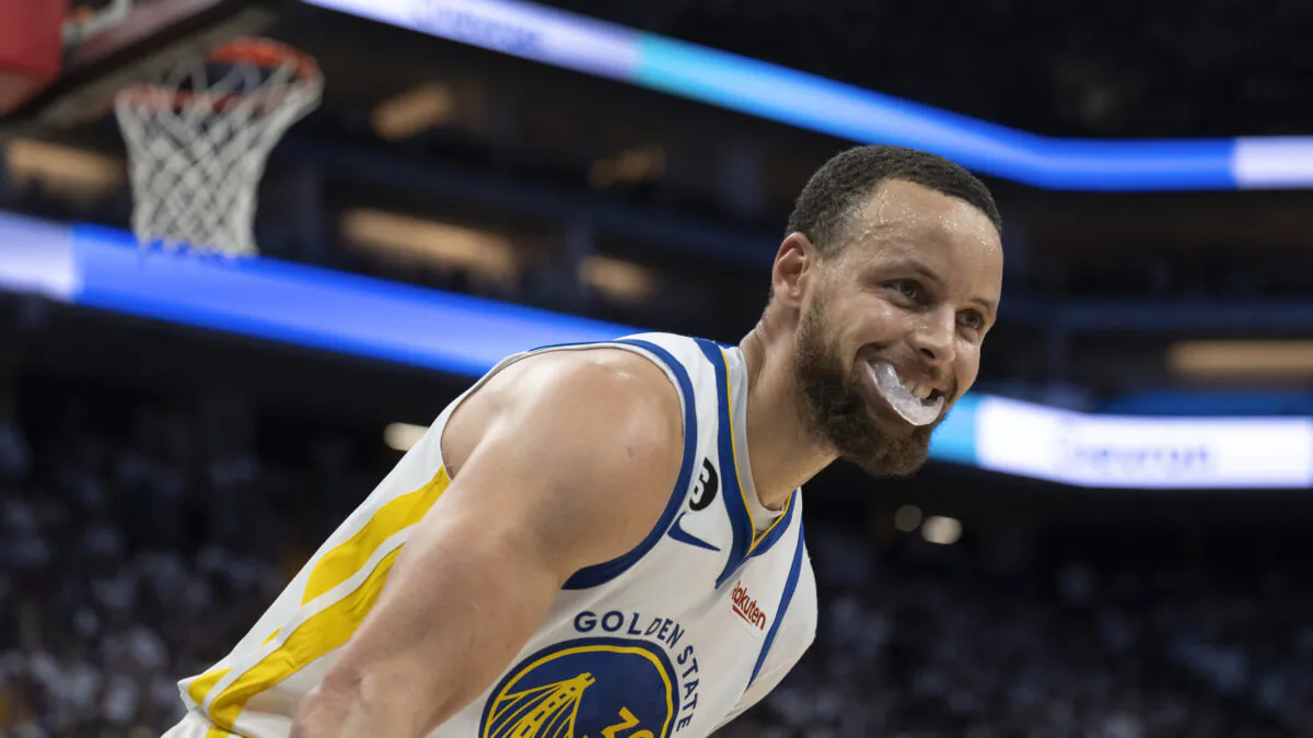 Golden State Warriors guard Stephen Curry (30) all smiles after scoring his 50th point during the second half of Game 7 of an NBA basketball first-round playoff series against the Sacramento Kings in Sacramento, Calif., April 30, 2023. (José Luis Villegas/AP Photo)