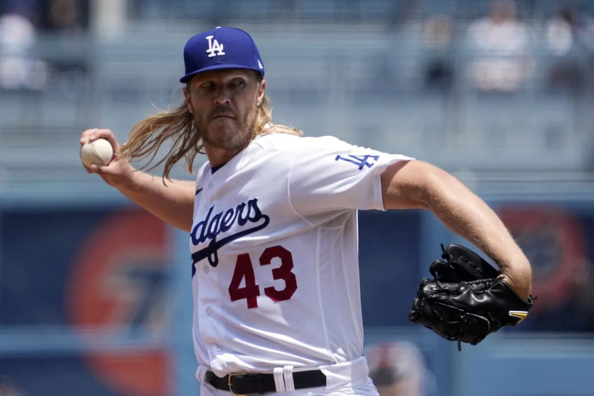 Los Angeles Dodgers starting pitcher Noah Syndergaard throws to the plate during the first inning of a baseball game against the St. Louis Cardinals in Los Angeles on Sunday, April 30, 2023. (AP Photo/Mark J. Terrill)
