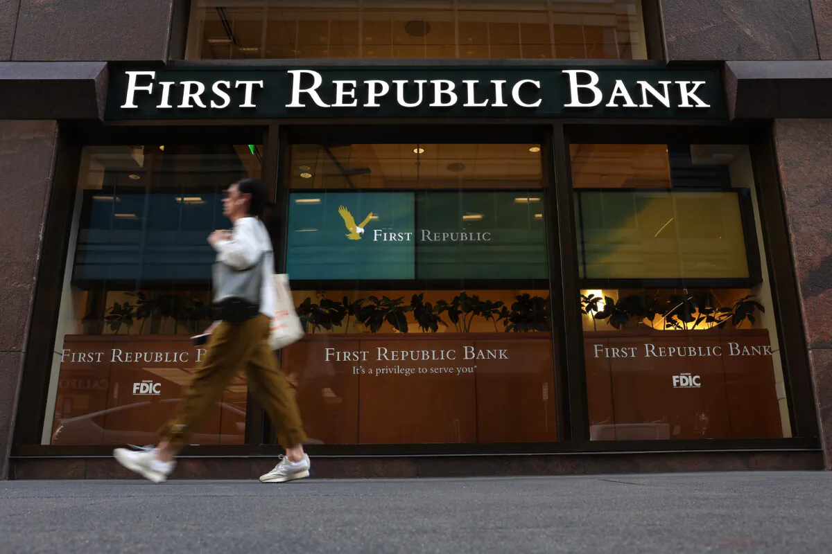 A pedestrian walks by a First Republic Bank in San Francisco, California, on April 26, 2023. (Justin Sullivan/Getty Images)
