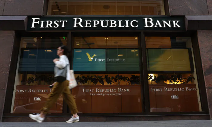 A pedestrian walks by a First Republic Bank in San Francisco, California, on April 26, 2023. (Justin Sullivan/Getty Images)