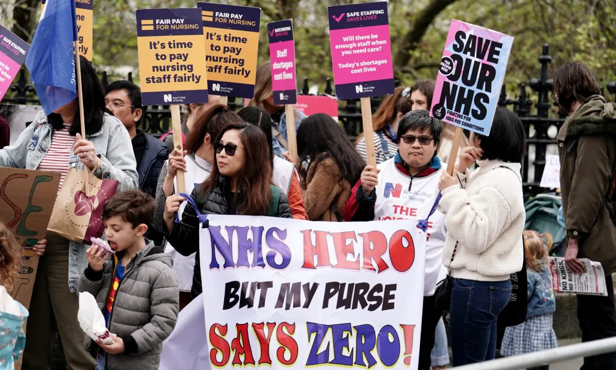 NHS workers on the picket line at St. Thomas' Hospital, London, on May 1, 2023. (Jordan Pettitt/PA Media)