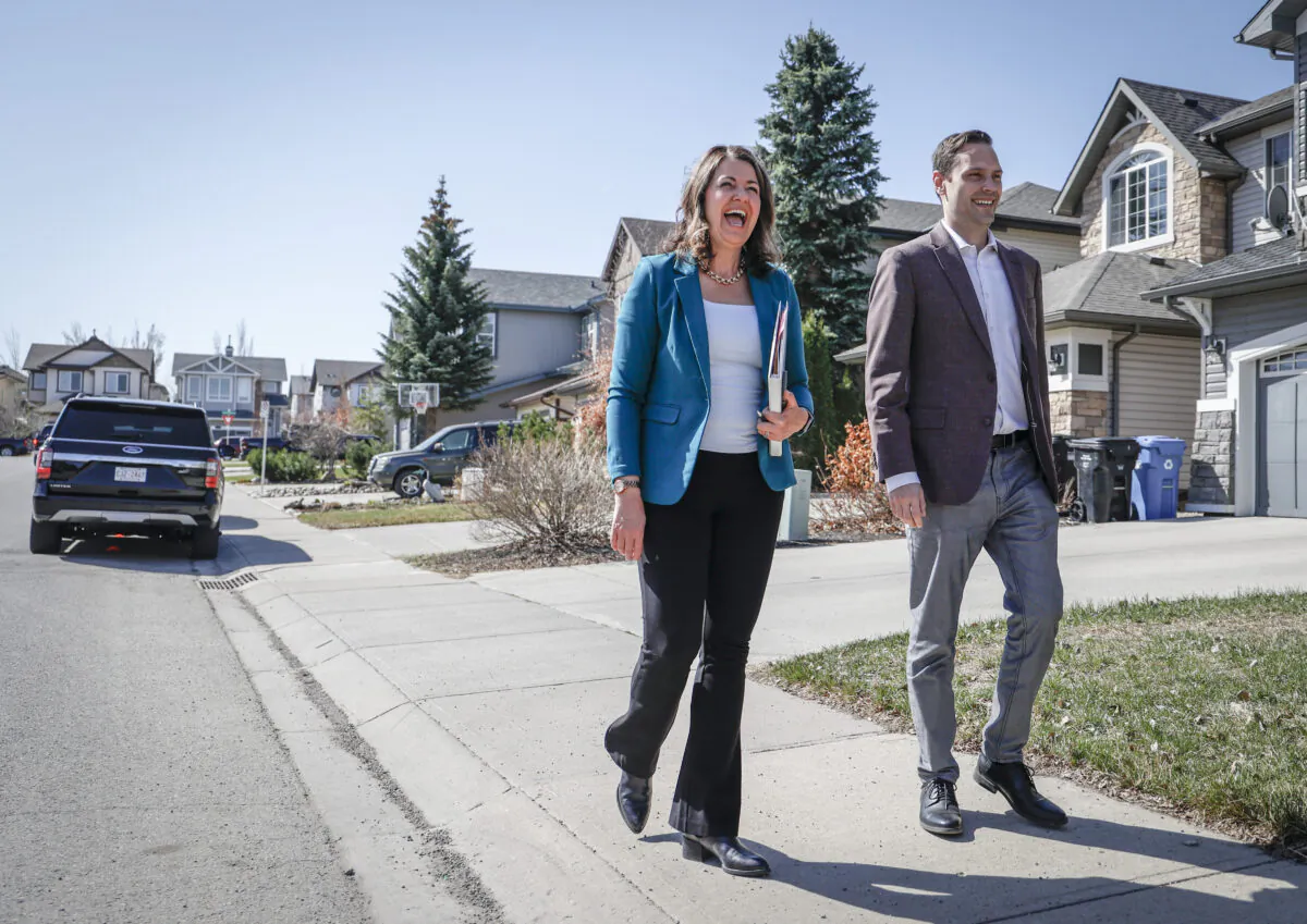 United Conservative Party leader Danielle Smith, left, arrives to makes an election campaign announcement in Calgary, Alta., Monday, May 1, 2023. (Jeff McIntosh/The Canadian Press)